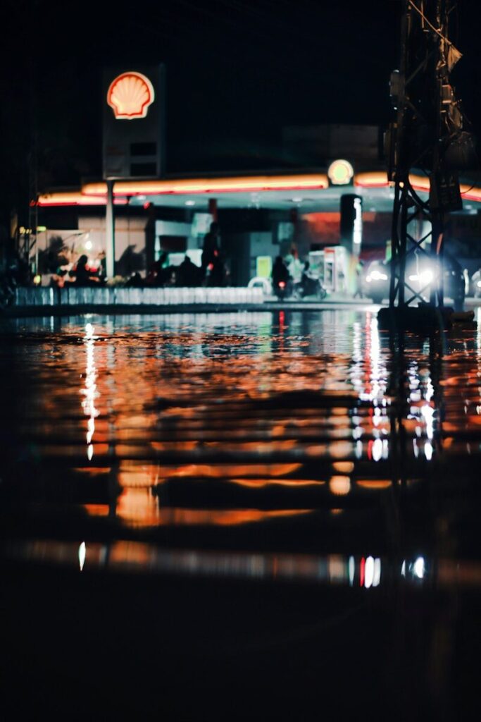 people walking on street during night time